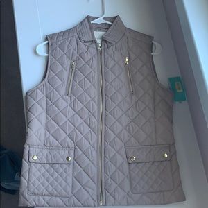 beige vest. Never worn